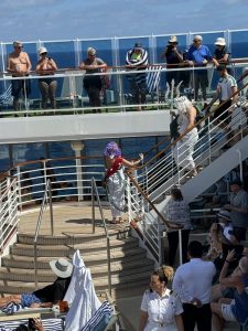 King Neptune headed to the ceremony. The Cruise Director staff did an awesome job!