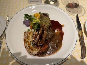 Chef's Table Main Course - lamb chop, beef tenderloin and lobster.
