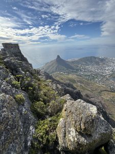 Cable car in the foreground and Cape Town in the background.