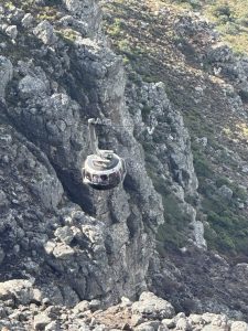 The unique design has the car doing a full rotation twice during the climb and descent.