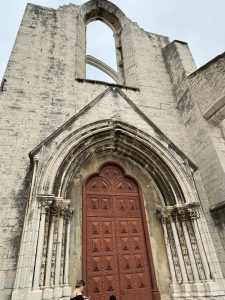 A monastery that was ruined in the earthquake of 1755 but has not been rebuilt. It was here the Carnation Revolution began in 1974. The reason they call it the Carnation Revolution is that a woman selling carnations in the square handed them out to the soldiers that were marching for freedom.