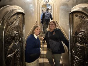Walking the narrow passage to see the Virgin statue.