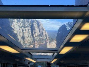In the funicular ride to top of Montserrat, with the monastery below.