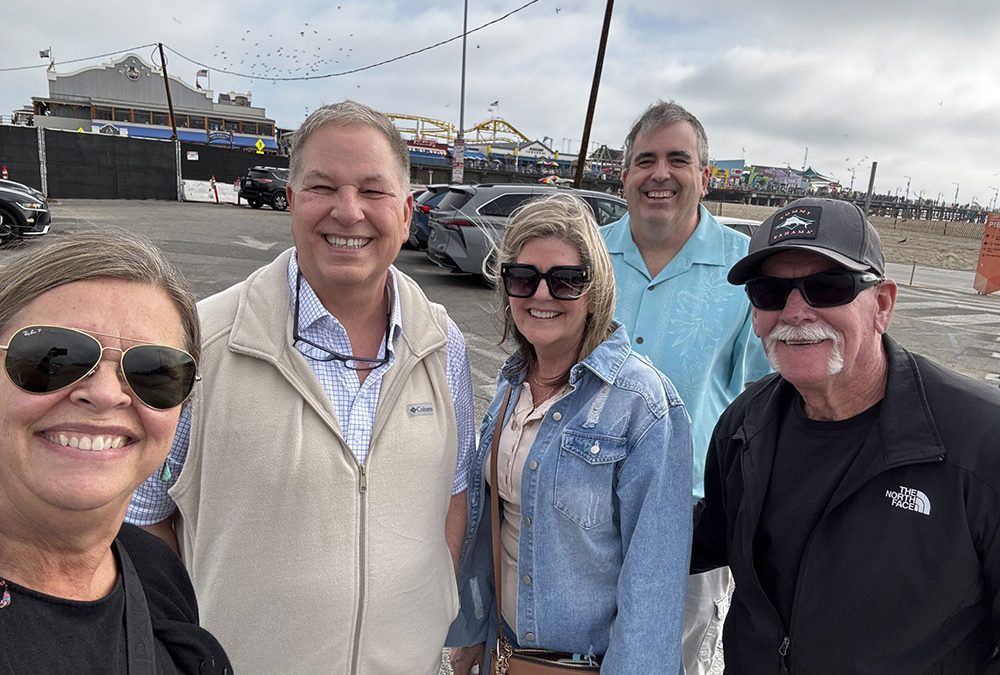 Sharon, Marshall and friends posing for a selfie in Santa Monica